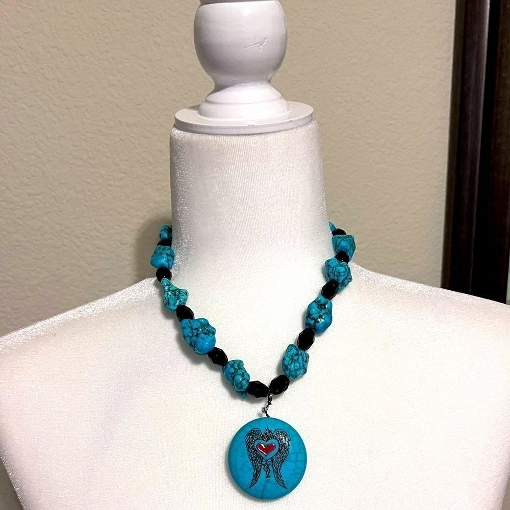 Blue stone angel heart necklace